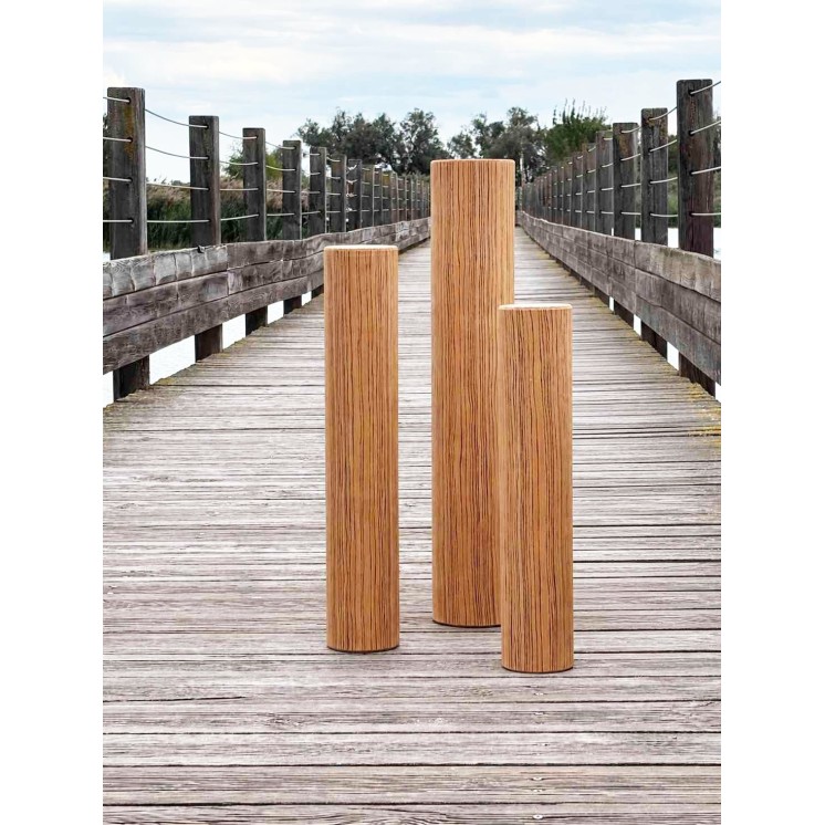 15-minute Rain Pillar with zebrano finish shown in an outdoor setting on a wooden walkway